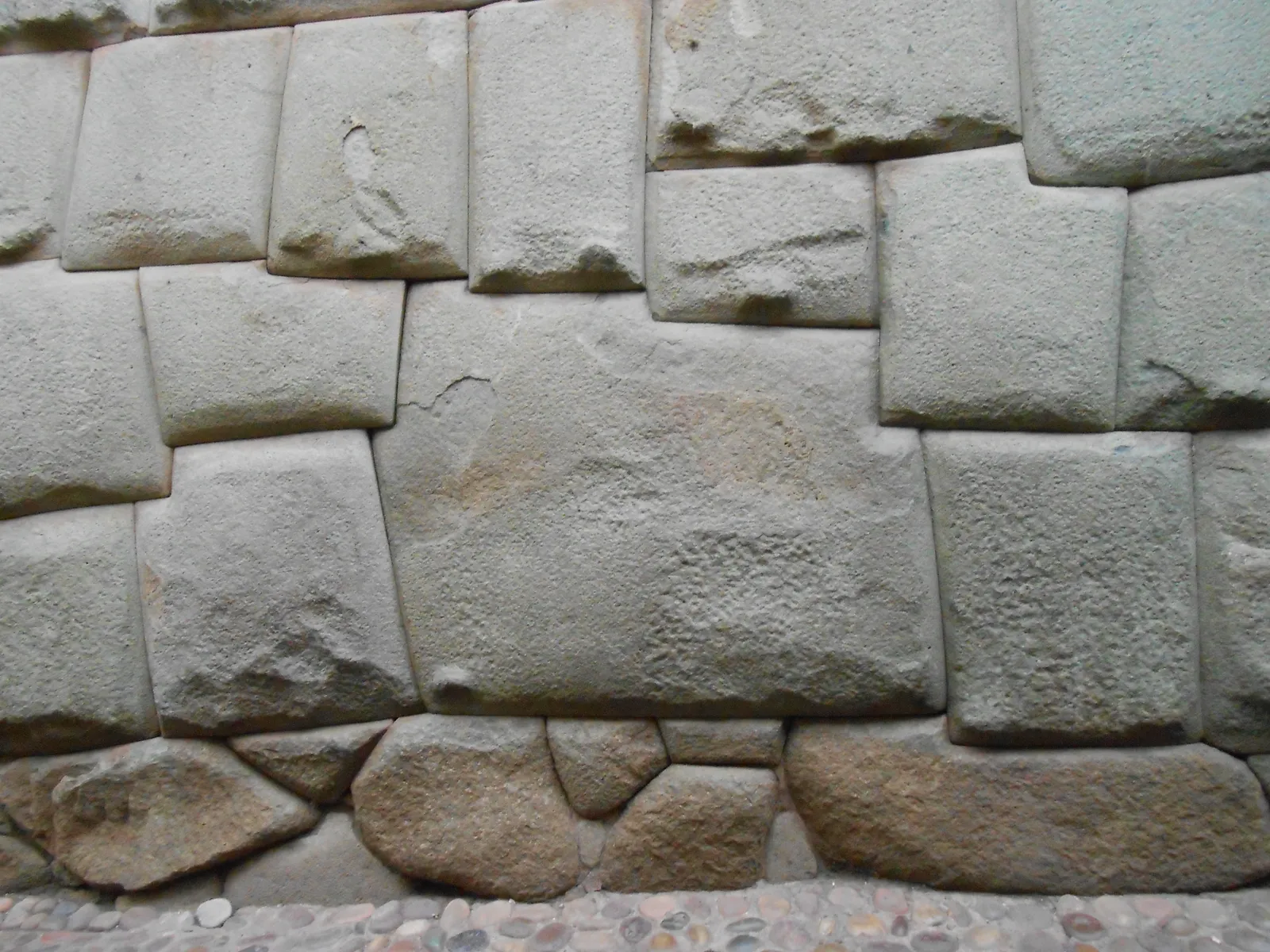 The twelve-angled stone in Cusco, a large pale block cut with twelve corners and locked into the surrounding Inca wall with no mortar in any of the joints