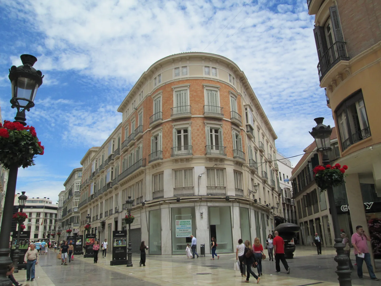 Calle Larios, Málaga's pedestrianized 1891 shopping street, lined with flower baskets and neoclassical facades