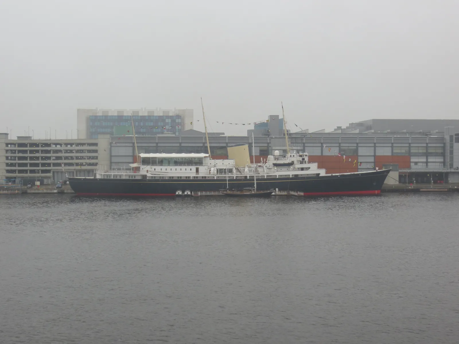 The former Royal Yacht Britannia berthed alongside Ocean Terminal in Leith, Edinburgh