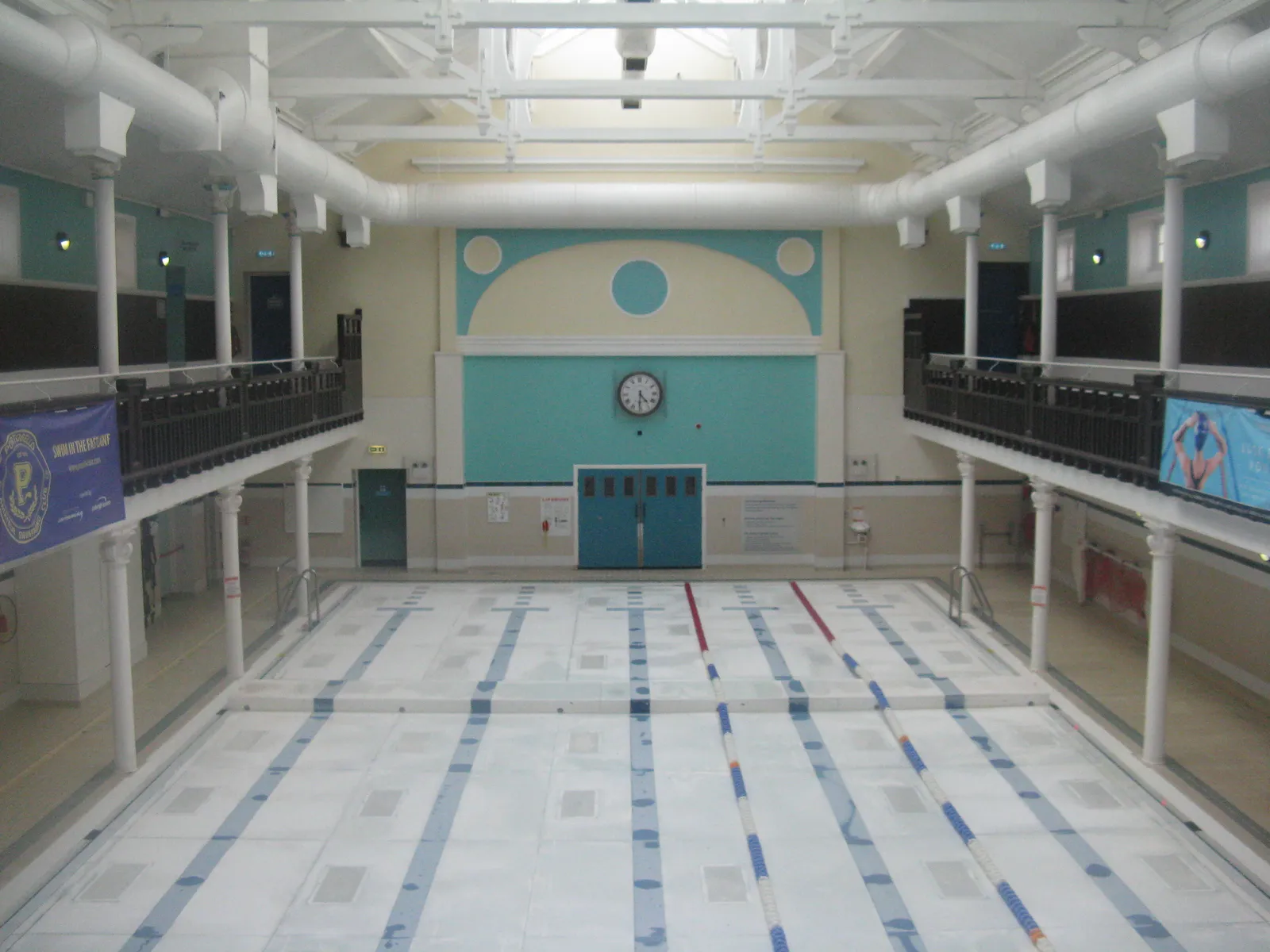 The Victorian-era indoor pool hall at Portobello Swim Centre, with its original tiled walls and balcony seating
