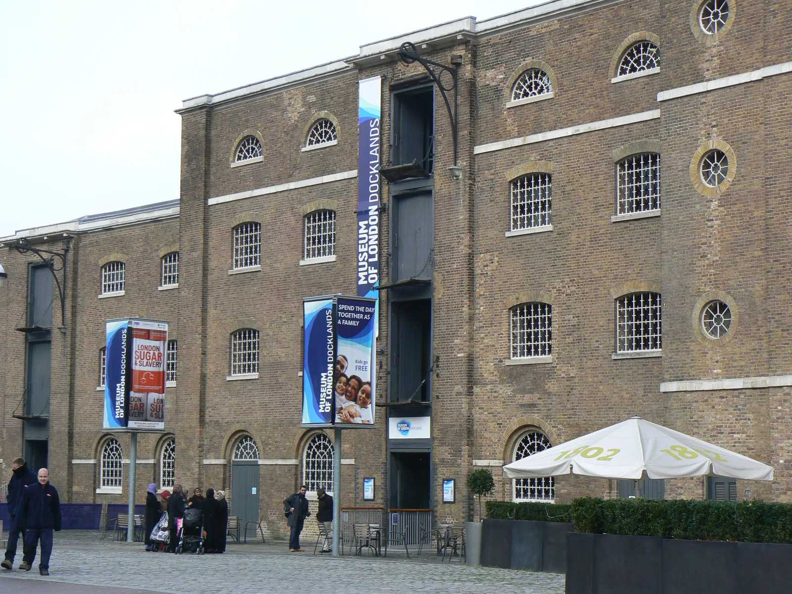The brick Georgian warehouse building housing the Museum of London Docklands at West India Quay