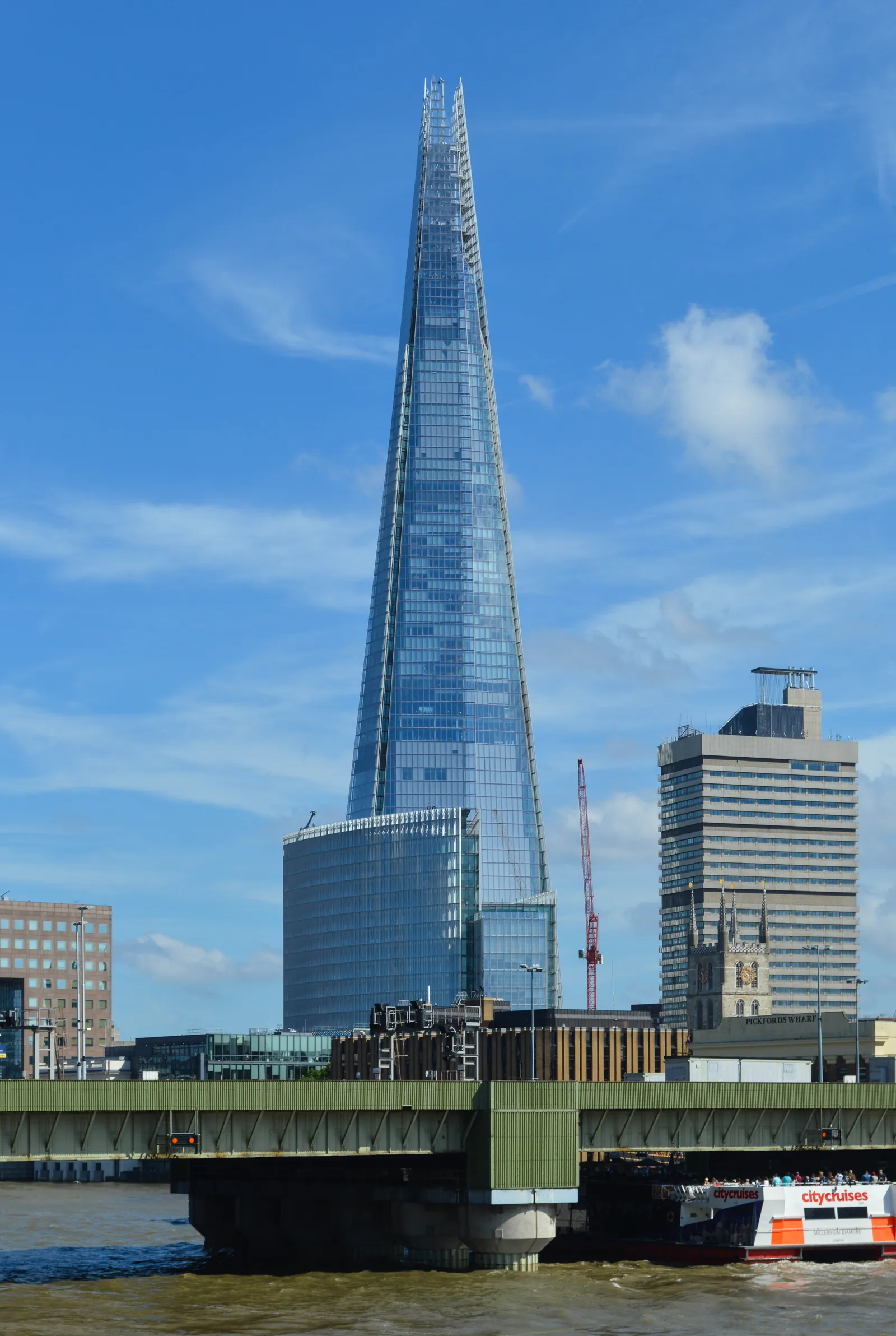 The Shard skyscraper rising above London Bridge Station on a clear day
