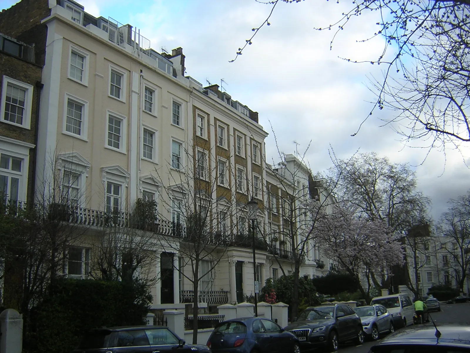 A quiet residential terrace of grand townhouses just off Portobello Road