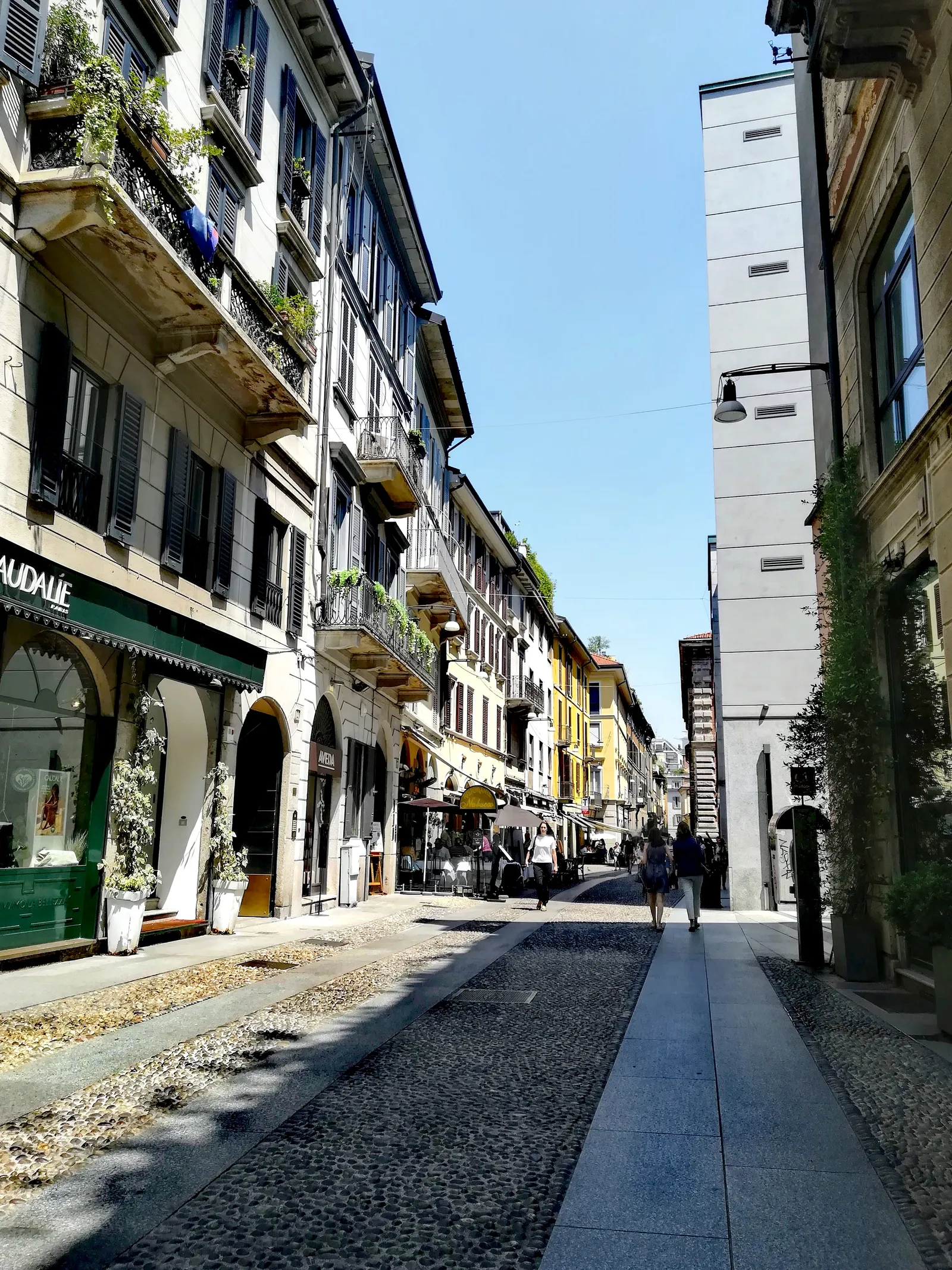 Via Fiori Chiari, a pedestrianized cobblestone street in Milan's Brera district lined with boutiques and cafes