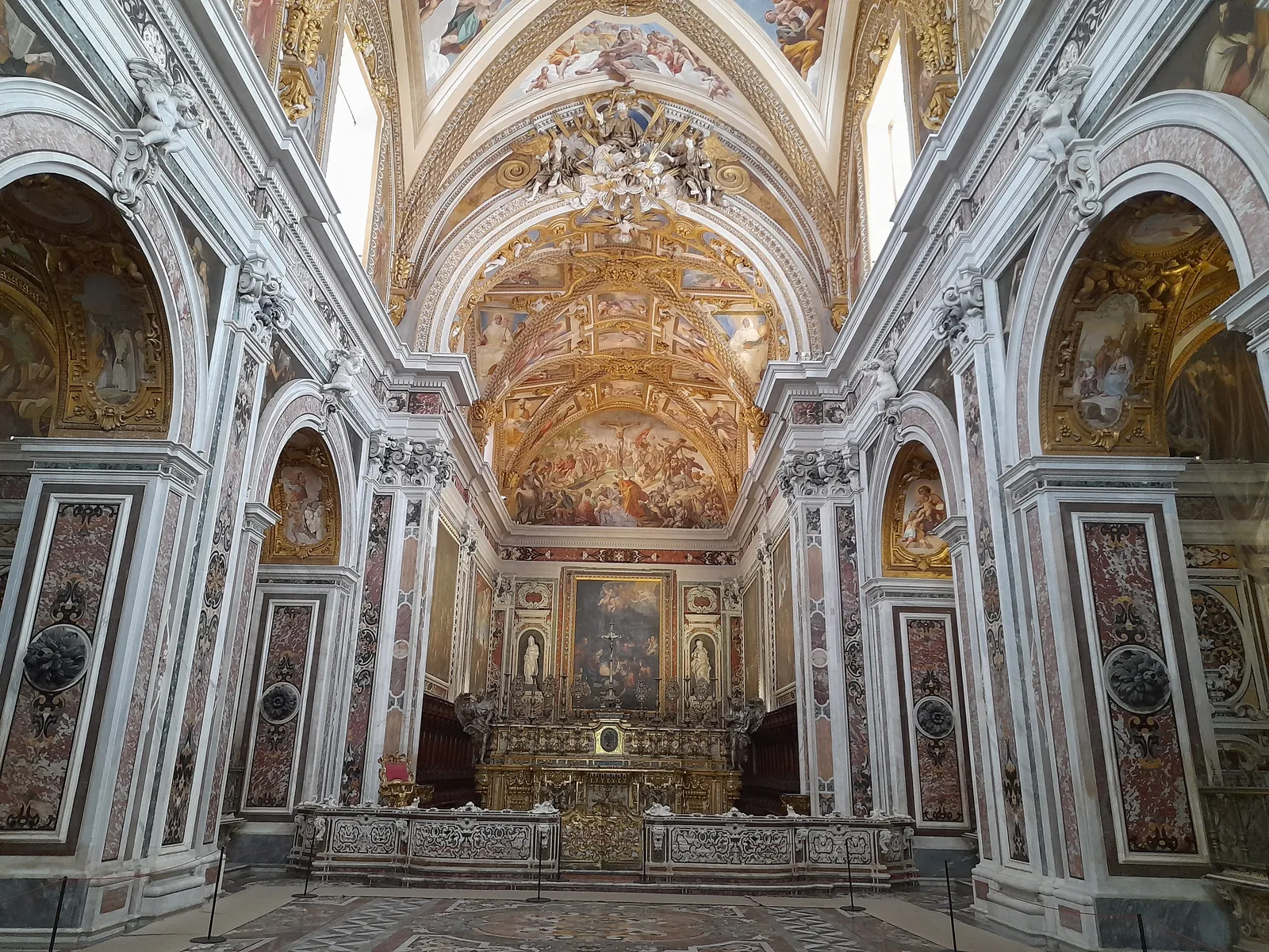 The gilded, fresco-covered interior of the church at the Certosa di San Martino monastery in Naples