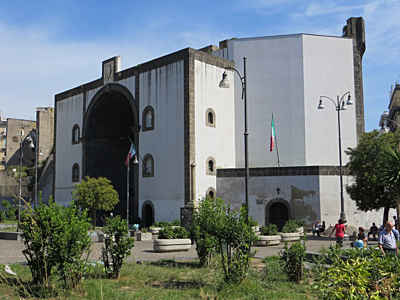 Porta Capuana, a Renaissance-era stone city gate in Naples, seen across its piazza