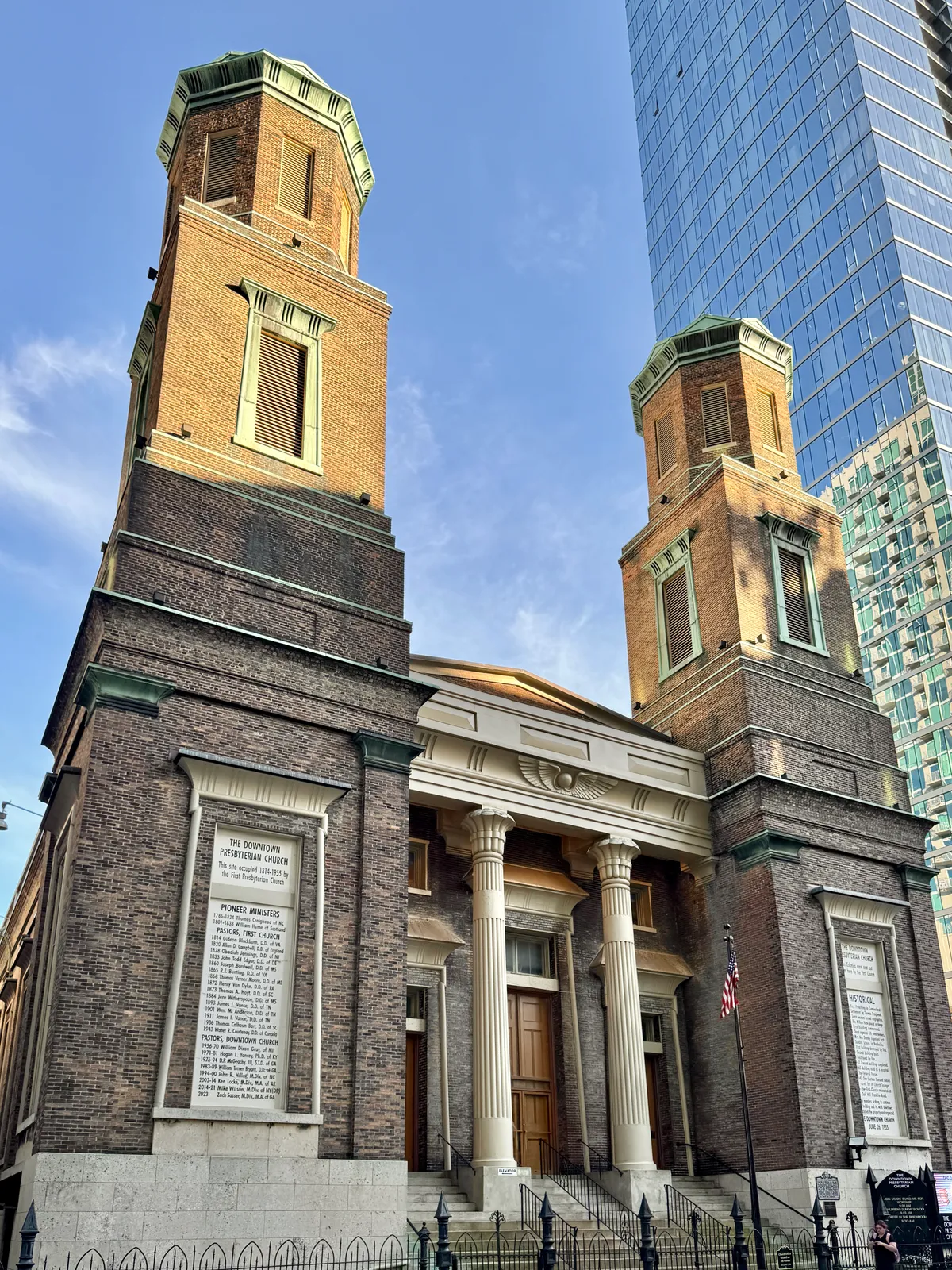 The Downtown Presbyterian Church in Nashville, its brick facade flanked by two battered Egyptian-style towers with a columned porch and winged sun disk between them