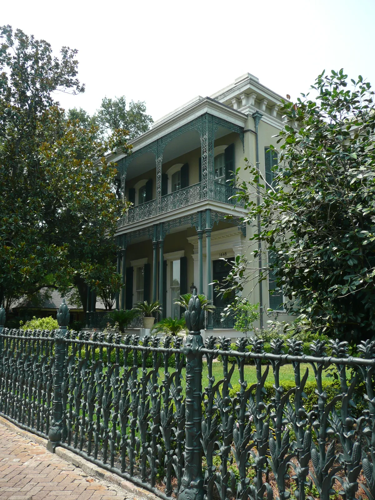 Colonel Short's Villa in the New Orleans Garden District behind its dark green cast-iron fence, every railing moulded as a stalk of corn with morning glories twined through it