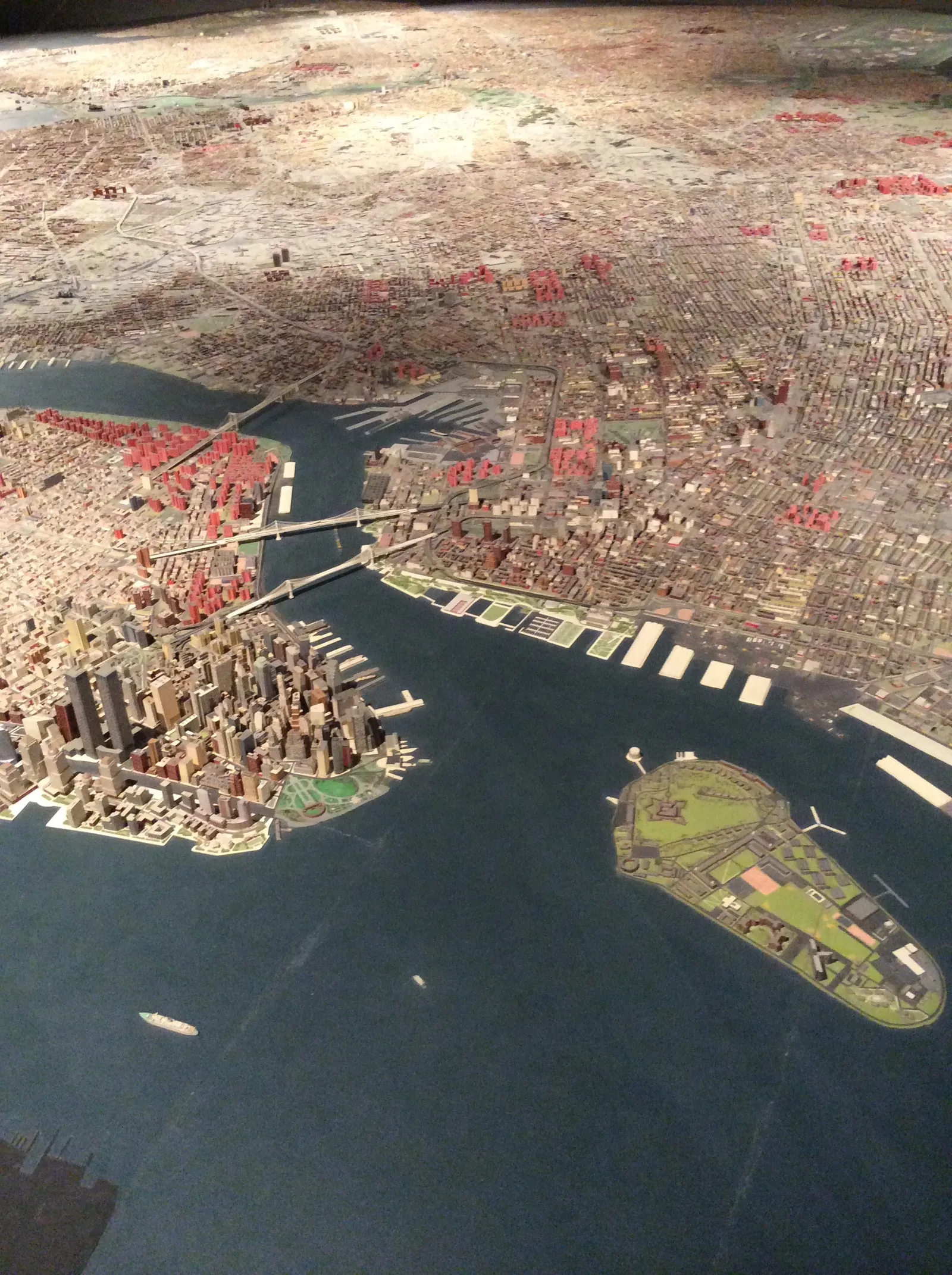 The Panorama of the City of New York at the Queens Museum, a vast scale model showing Lower Manhattan's towers, the harbour, Governors Island and the bridges to Brooklyn